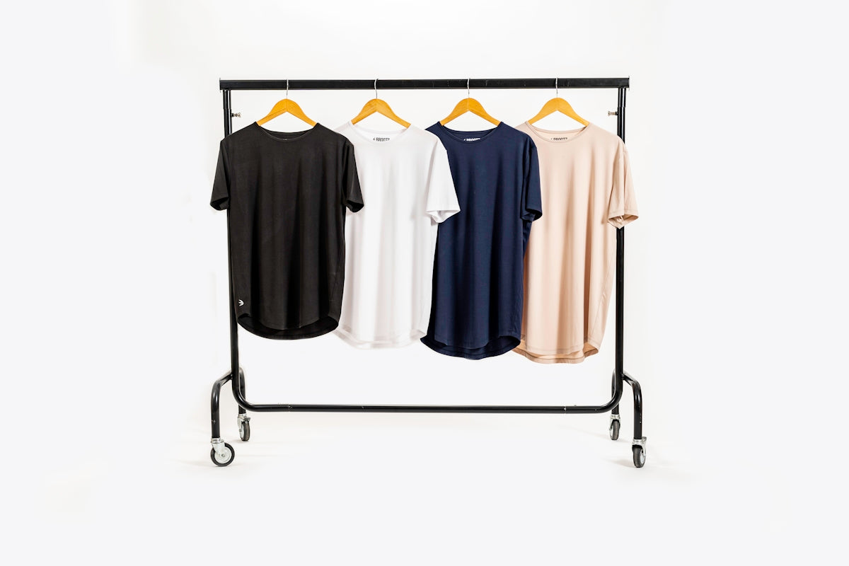 a group of clothes on a rack